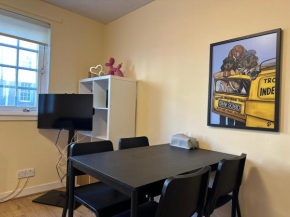 One room with parking space